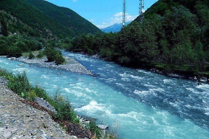 Ananuri, Gudauri, Kazbegi. Military Road of Georgia. Private tour. - Zhinvali Reservoir: turquoise water at the road’s first pause