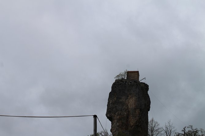 Chiatura. Soviet Past in the present. + Katskhi pillar - Mgvimevi Monastery through steps and a tunnel