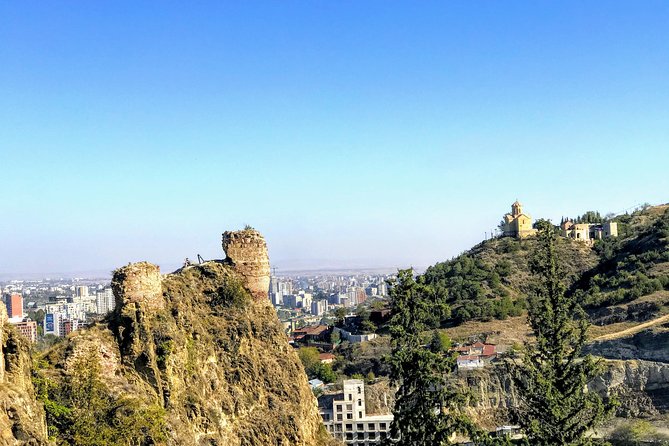 Discover Tbilisi: Hidden Gems and Iconic Sights Walking Tour - The Bridge of Peace and the riverfront contrast
