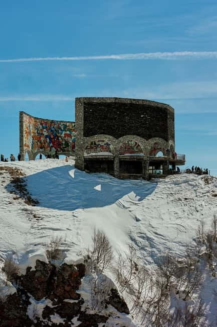 From Tbilisi: Ananuri, Gudauri, and Kazbegi Tour with Guide - Starting in Freedom Square and settling into the minibus