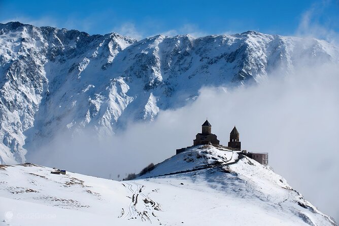 From Tbilisi Daytrip Kazbegi Gudauri & Zhinvali Guided Group Tour - Gergeti Trinity Church and the Extra 4x4 Ride
