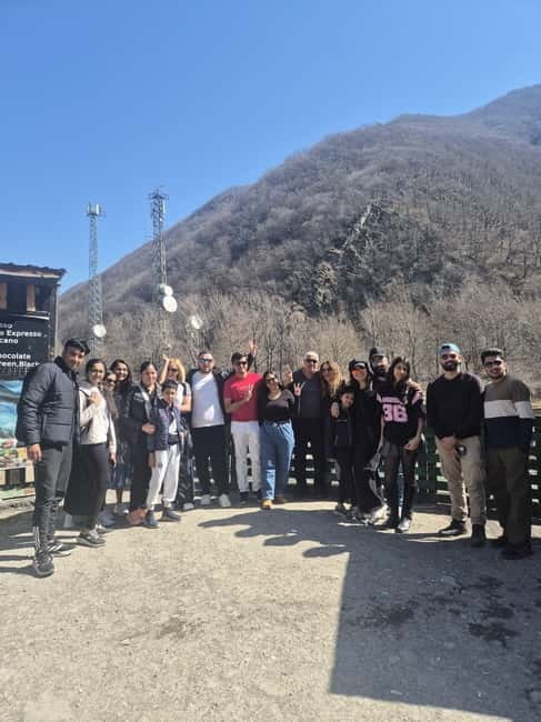 From Tbilisi: Kazbegi, Gudauri & Gergeti Group Day Tour - Ananuri Fortress above the reservoir
