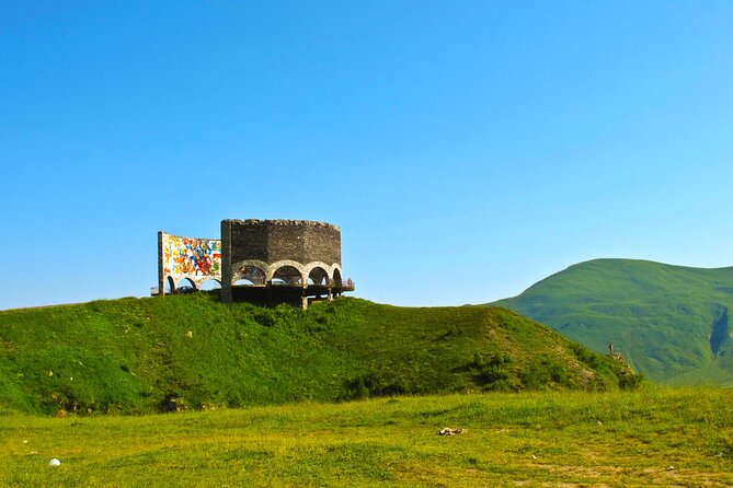 Georgia’s Historic Wonders: Private Zhinvali, Gergeti Exploration - Gergeti Trinity Church Against the Kazbegi Mountains