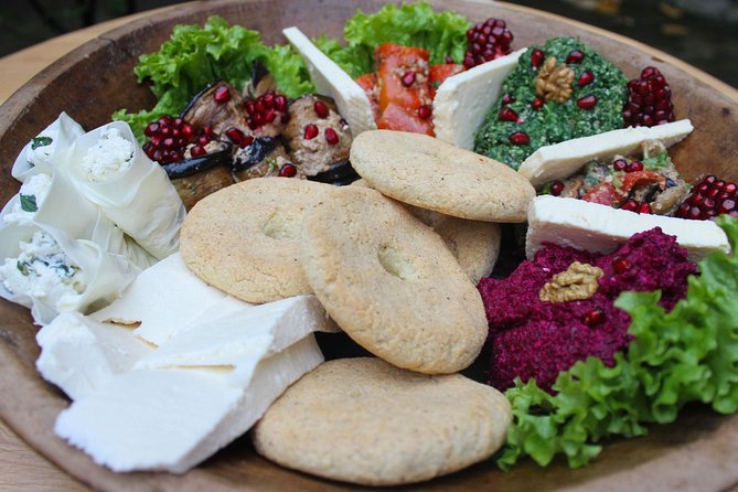 Private Cooking Class with a Tbilisi Food and City Expert Dinara - Meeting Dinara, a former café owner and city guide
