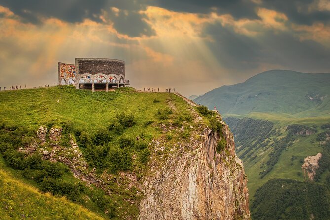 Private Day Tour to Kazbegi and Gudauri - Ananuri Fortress explains the road north