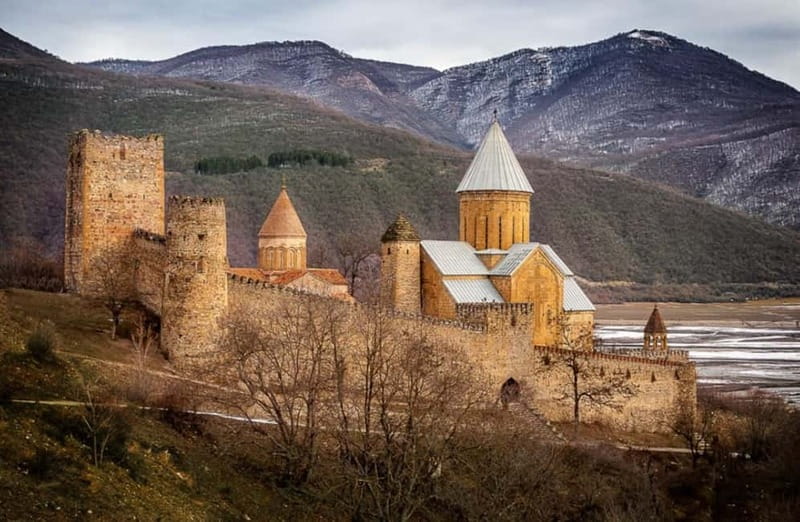 Private day trip to Stepantsminda, Kazbegi Mountains & Sno - Pasanauri and the case for carrying a picnic
