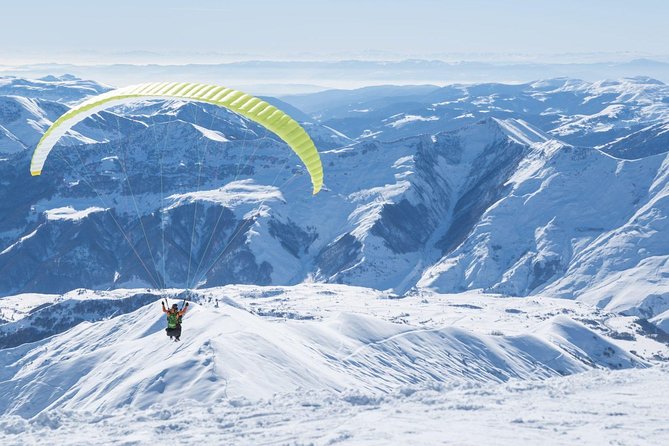 Private Full Day Tour In Kazbegi - Gudauri (Paragliding & Rafting) - Guides, vehicle, and what is included