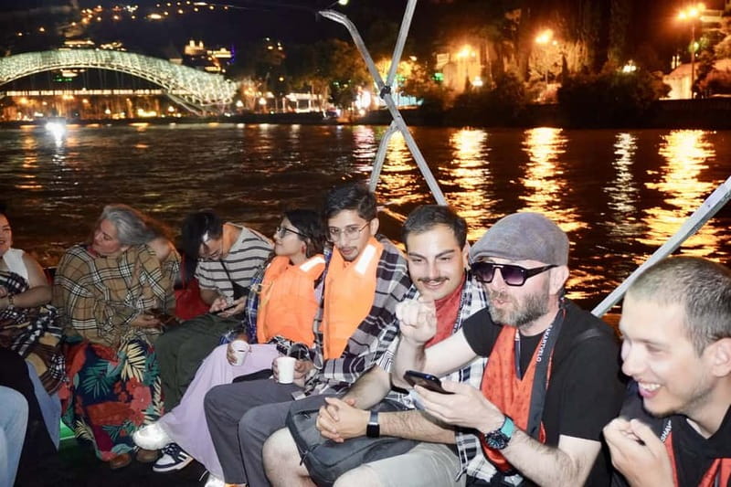 Tbilisi: Evening Walking Tour with Wine & Boat Ride Options - Key points at a glance