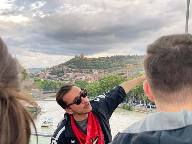 Tbilisi: Evening Walking Tour with Wine & Boat Ride Options - Liberty Square and the shift toward Old Town