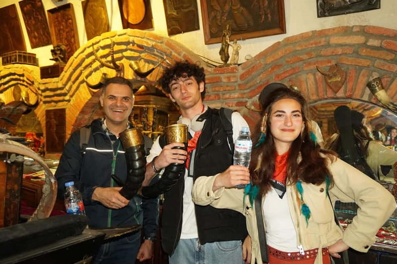 Tbilisi: Evening Walking Tour with Wine & Boat Ride Options - The Clock Tower and Rezo Gabriadze’s playful design
