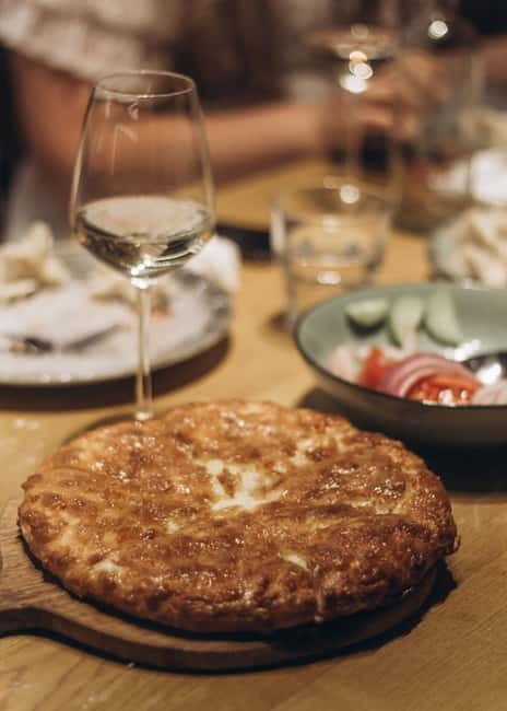 Tbilisi: Georgian Cooking Class with Khinkali and Khachapuri - Starting With Georgian Wine, Cheese, and Salad