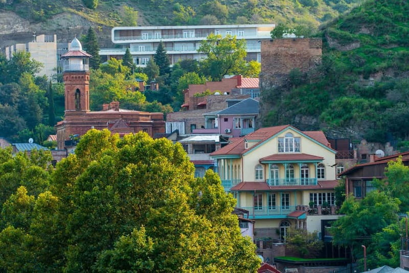 Tbilisi: Guided Tour to the Top 10 Sightseeing Attractions - Crossing the Bridge of Peace into old Tbilisi