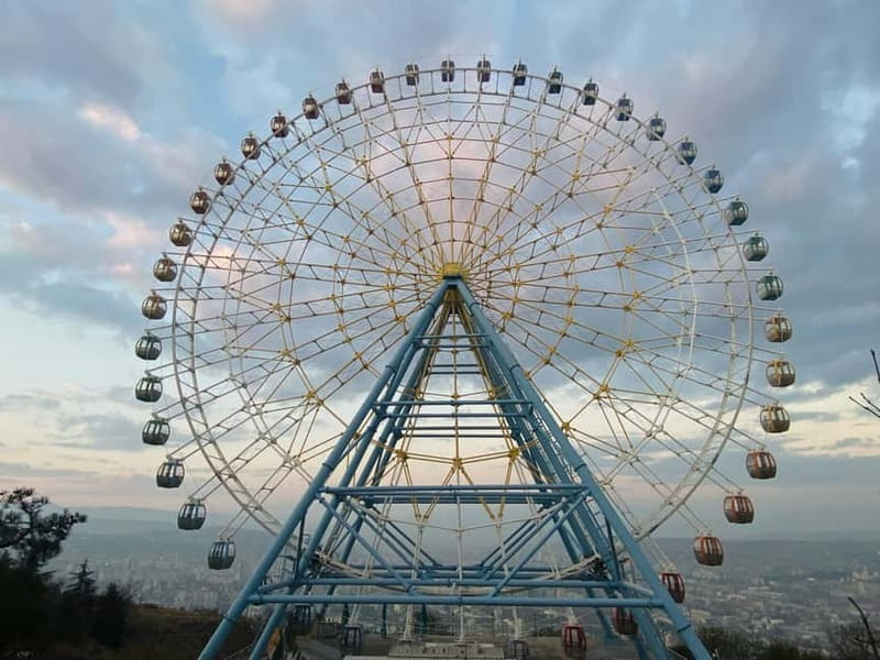 Tbilisi:New cable car, Mtatsminda with Lagidze water Tasting - Riding upward through Tbilisi