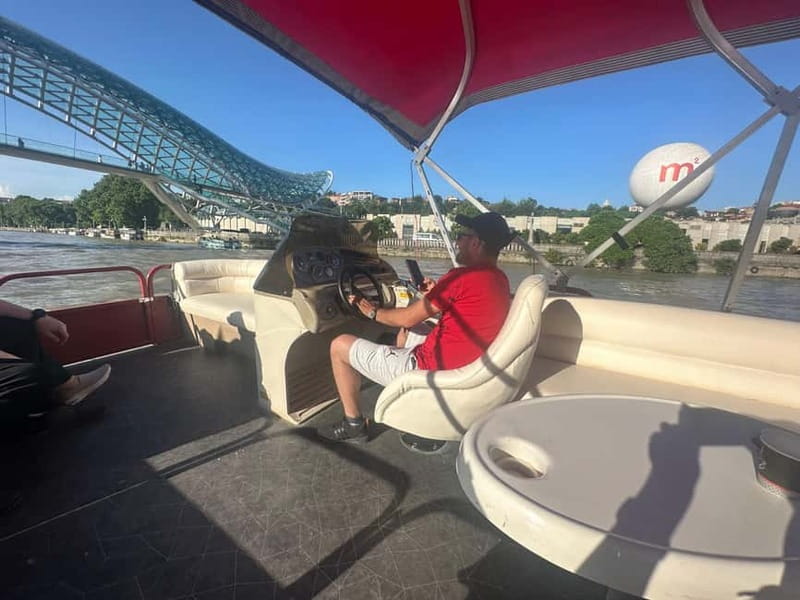 TBILISI: Private, exclusive Boat Ride & with Welcome Drink - Leaving the Old Town by boat