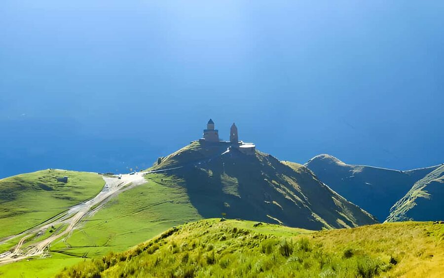 Tbilisi to Kazbegi Gudauri Ananuri Zhinvali Group GuidedTour - Gergeti Trinity Church is the payoff