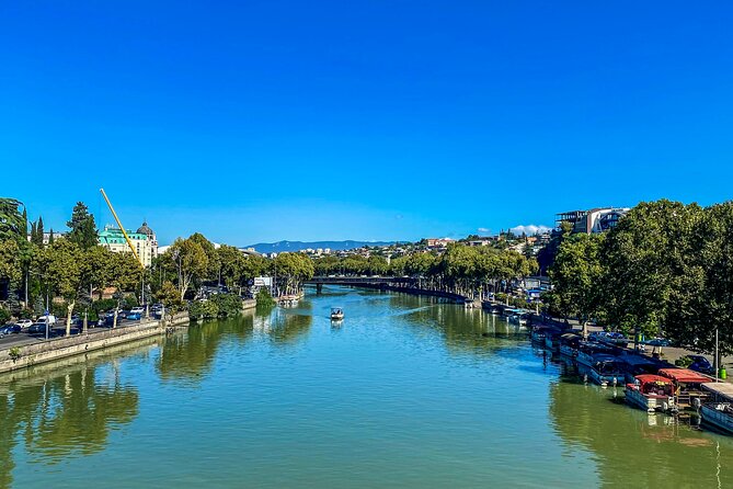 Tbilisi Walking Tour Including Cable Car and Traditional Bakery - Rike Park and the short ride above the river
