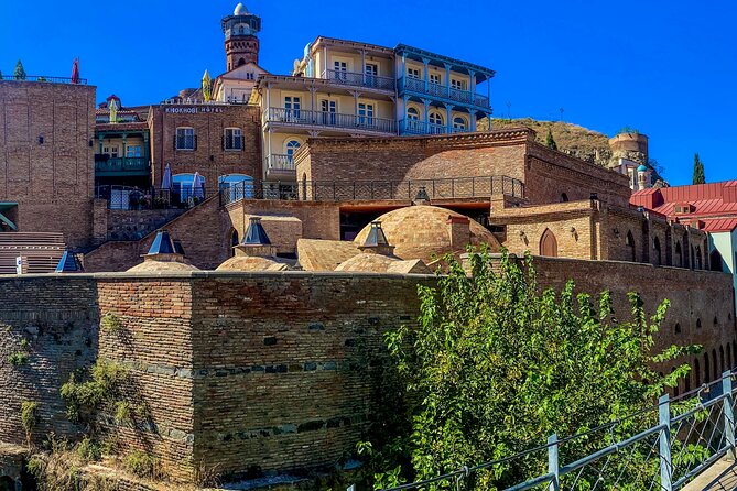 Tbilisi Walking Tour Including Cable Car and Traditional Bakery - Tamada, Shardeni Street, and the old bath district