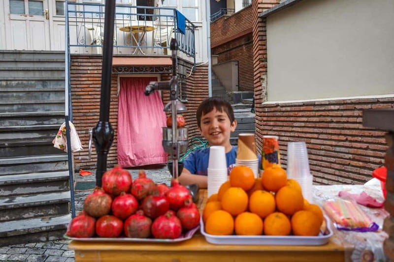 Walking Tour in Old Tbilisi - Group Tour - Crossing the Metekhi Bridge and riding uphill